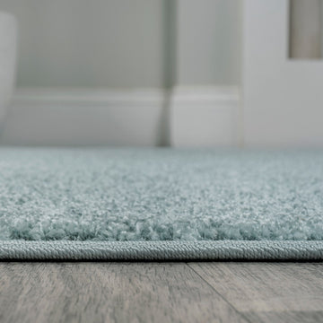 Haze Solid Low-pile Area Rug Light Blue